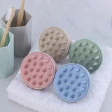 Silicone shampoo brush with ergonomic handle for gentle scalp cleansing and exfoliation