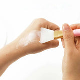 Soft silicone brush for gentle and precise application of skincare products and makeup.