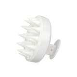 Silicone shampoo brush with ergonomic handle for gentle scalp cleansing and exfoliation