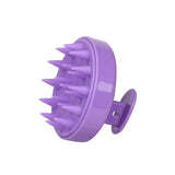 Silicone shampoo brush with ergonomic handle for gentle scalp cleansing and exfoliation